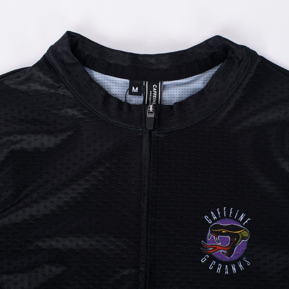 C&C Tattoo Series Skull Jersey: Black men's cycling jersey with a purple circular logo featuring a snake and "Caffeine & Cranks".