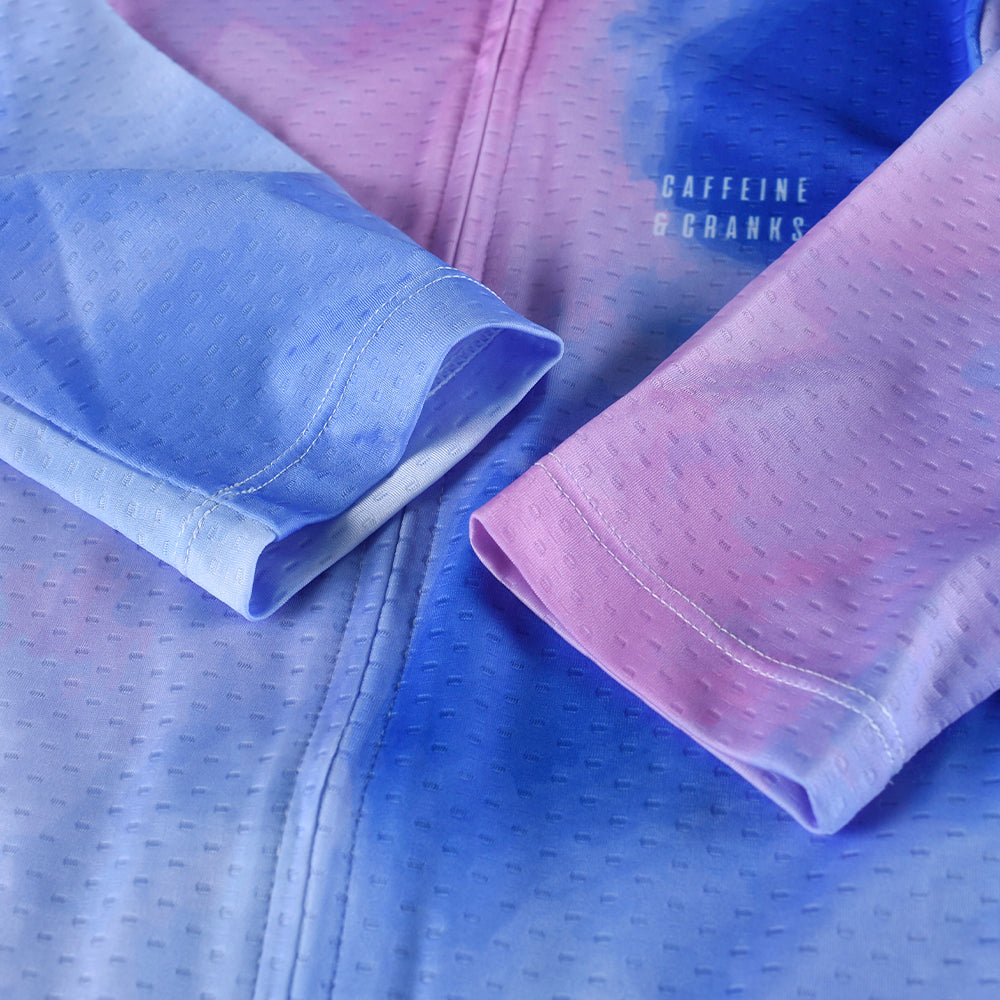 Close-up of C&C Coral Jersey - Womens, featuring blue & pink tie-dye print and breathable fabric.
