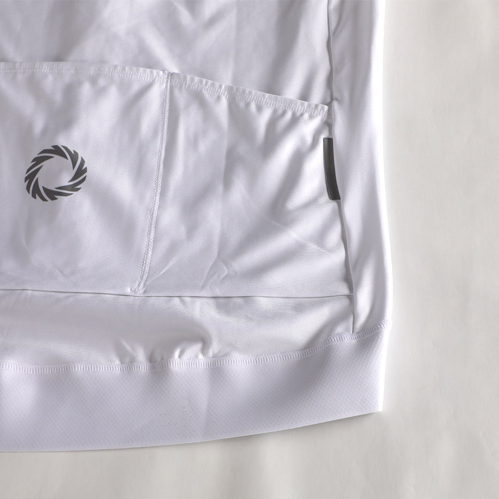 Close-up of white Pinnacle Thermal Jersey showing gray logo and pockets.