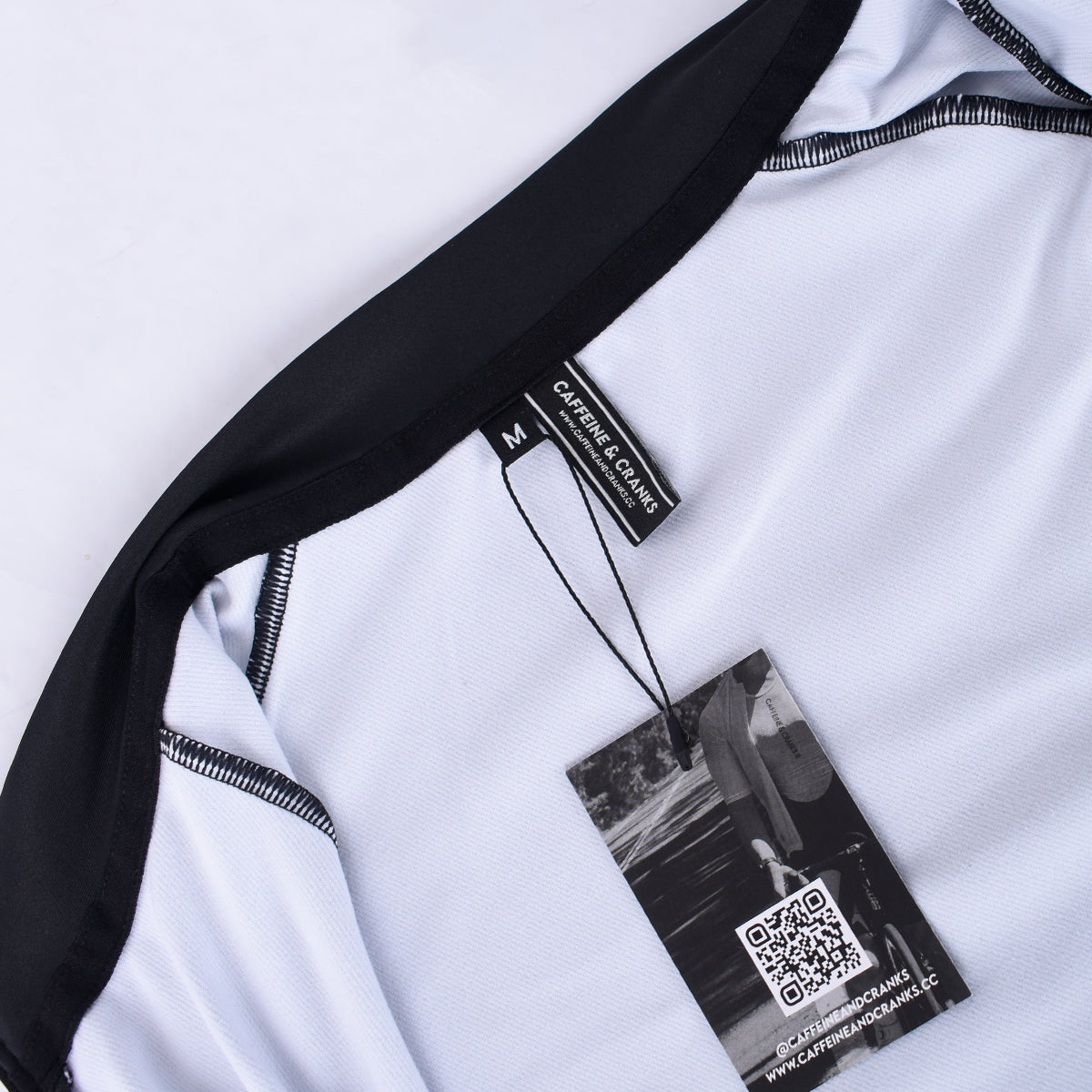 Close-up of men's black Core Thermal Jersey showing black collar & hem detail.