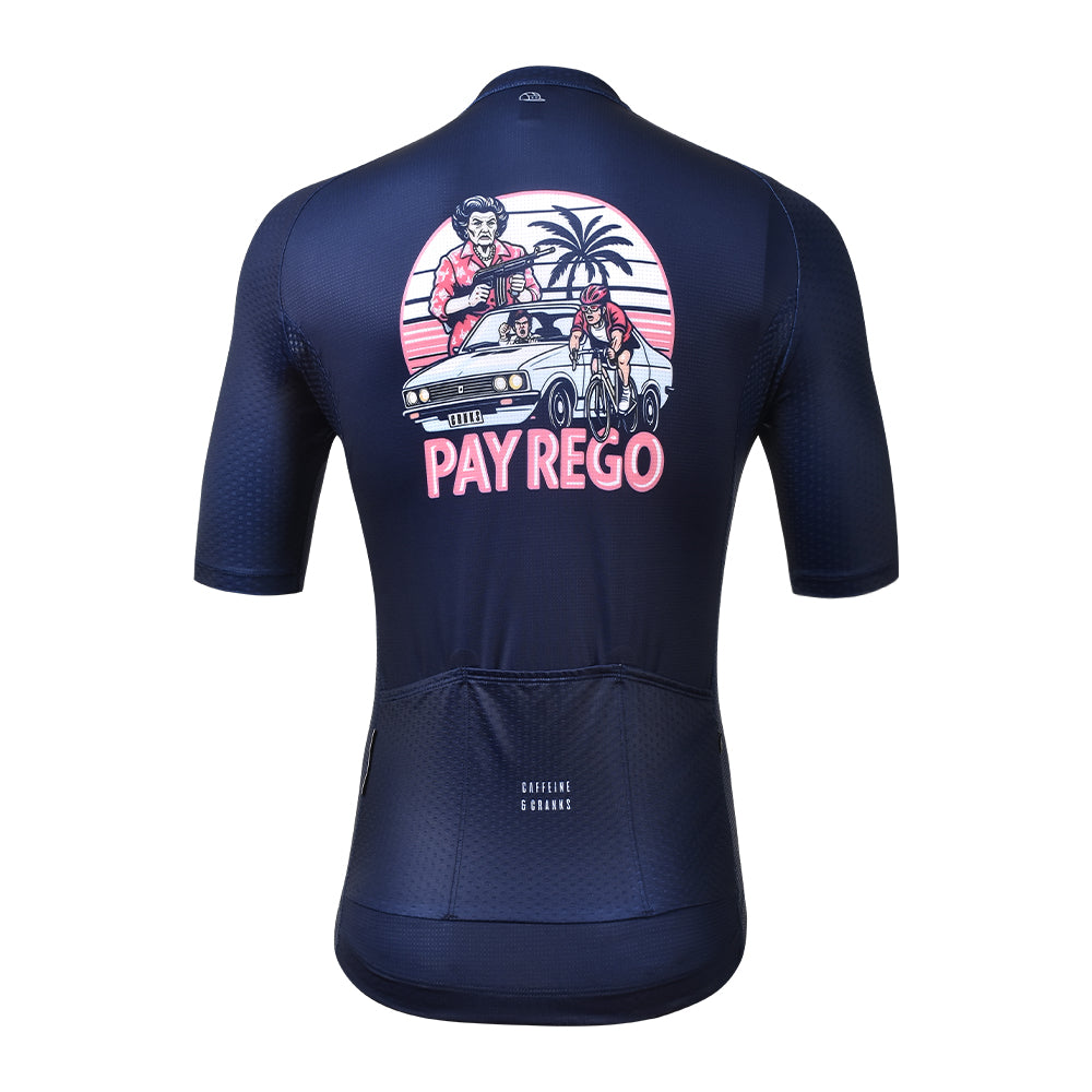 Back view of navy C&C Pay Rego Jersey. Features pink retro graphic with car & cyclist. Caffeine & Cranks logo.