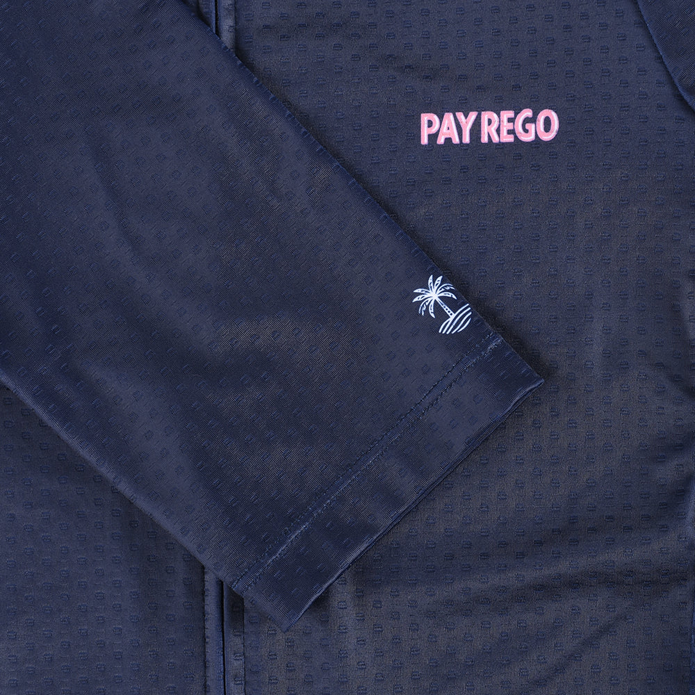 Close-up of navy C&C Pay Rego men's jersey with pink logo and embroidered palm tree detail.