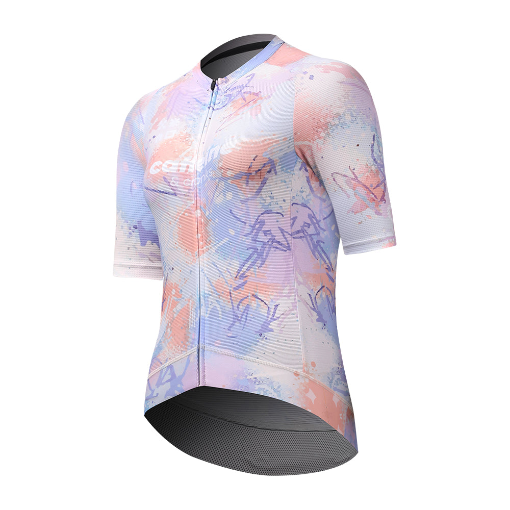 Side view of women's C&C Vapour Jersey with pastel paint splatter pattern in pinks, blues, and purples.