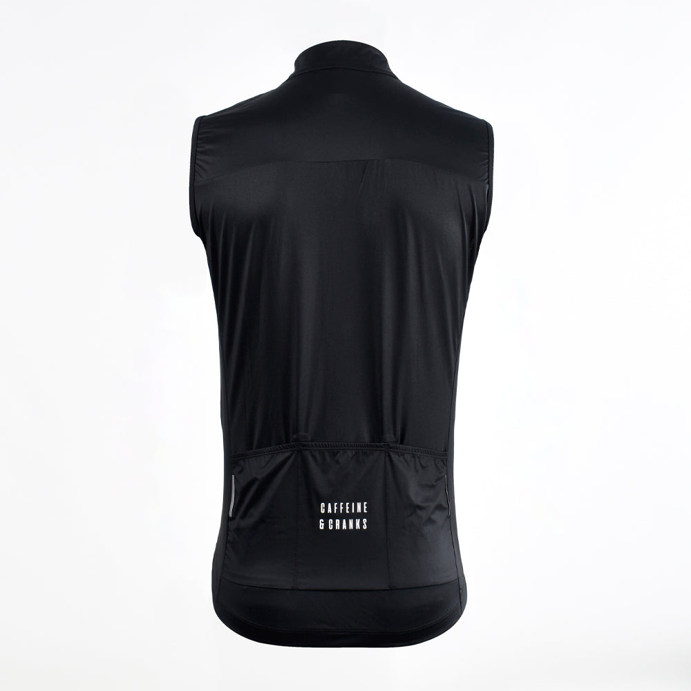 Back view of C&C Core Gilet in black, featuring logo and reflective accents.