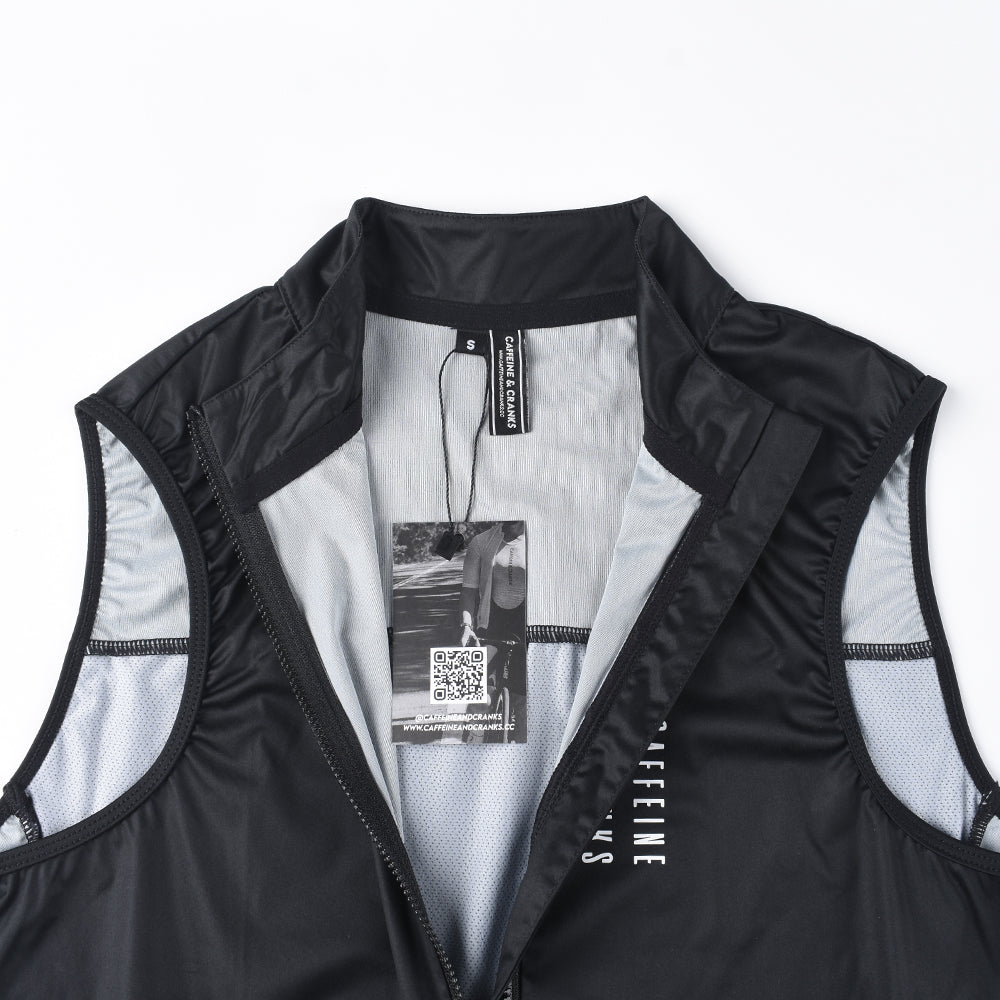 Front view of a black C&C Core Gilet for women, with mesh panels and a zip closure.