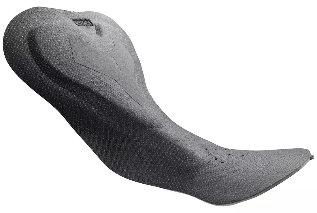 Black Pinnacle Bib Shorts women's chamois pad, showing texture and ventilation holes.
