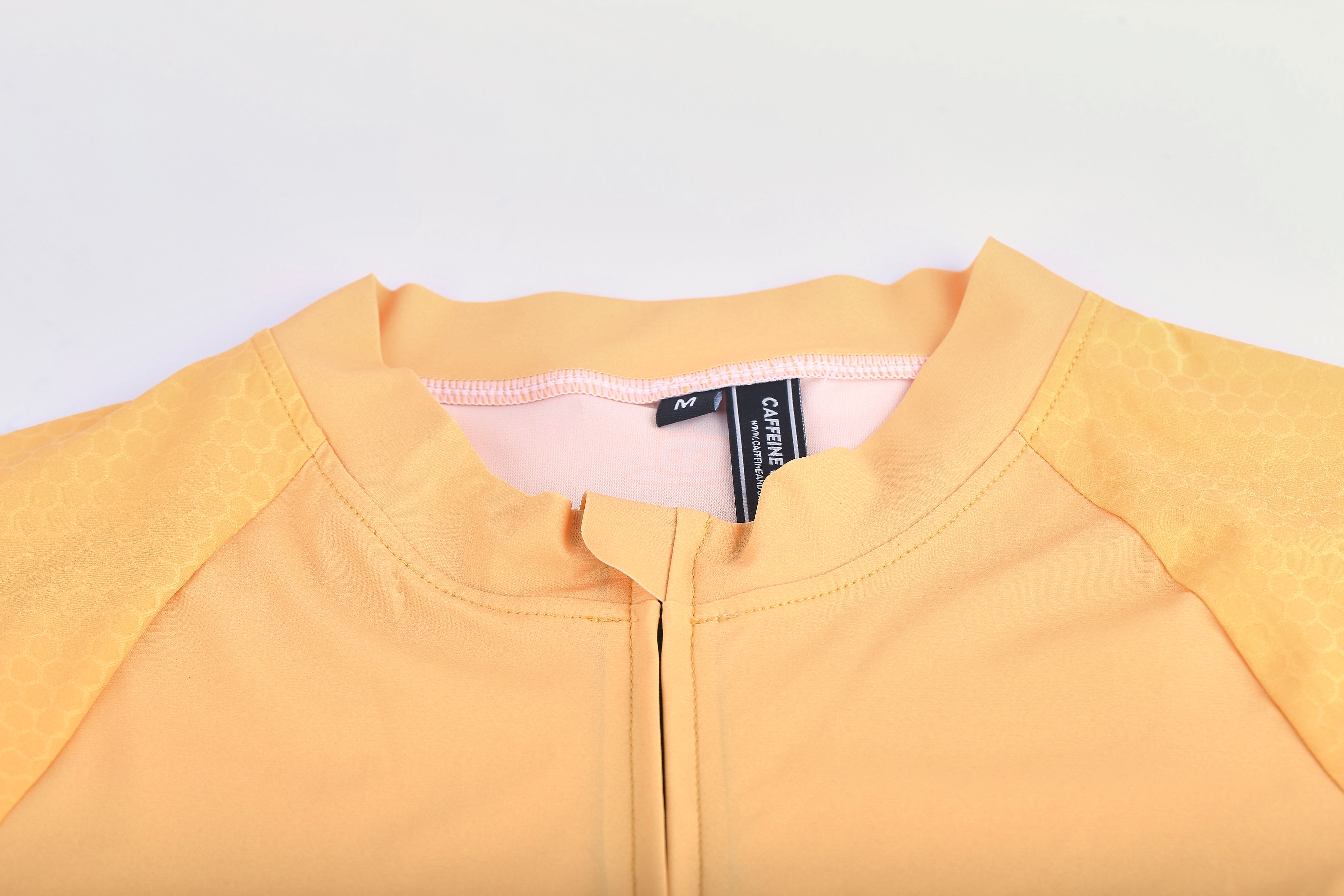 Women's Rust Pinnacle Jersey cycling jersey – detail view | Caffeine & Cranks Australia