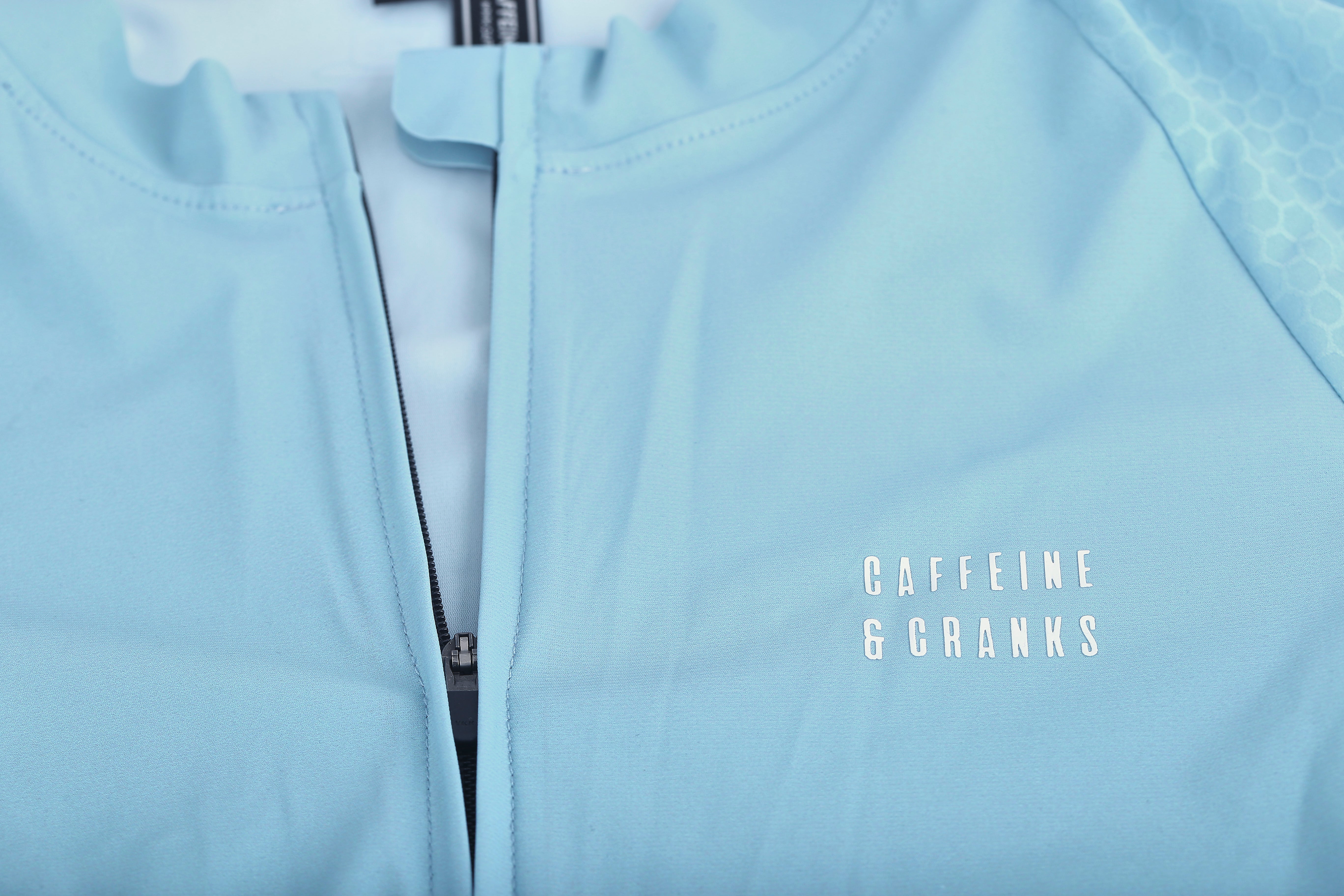 Women's Tide Pinnacle Jersey cycling jersey – detail view | Caffeine & Cranks Australia