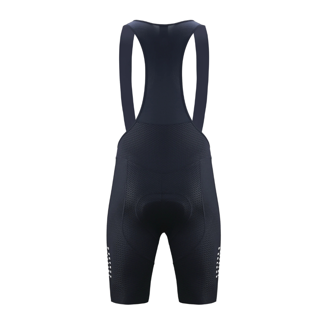 Back view of black women's Pinnacle bib shorts with white logo accents and padded seat.