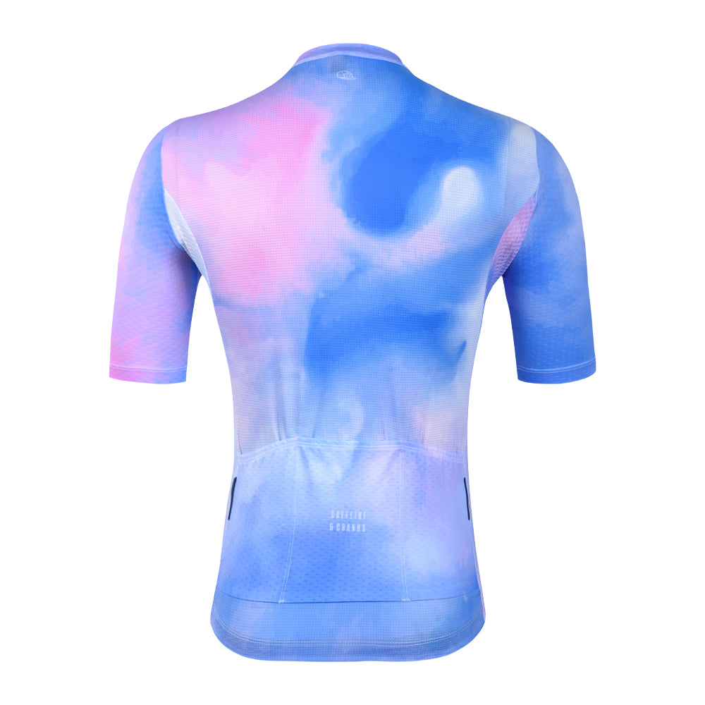 Back view of C&C Coral Jersey - Mens, with pink and blue abstract pattern and three back pockets.