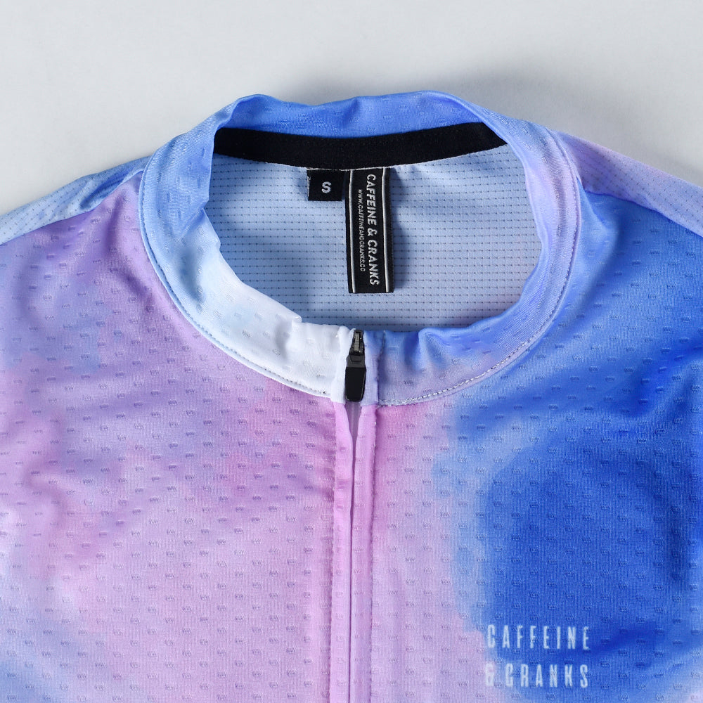 C&C Coral Jersey - Womens. Close up of collar and chest with pink & blue tie-dye pattern and full zipper.