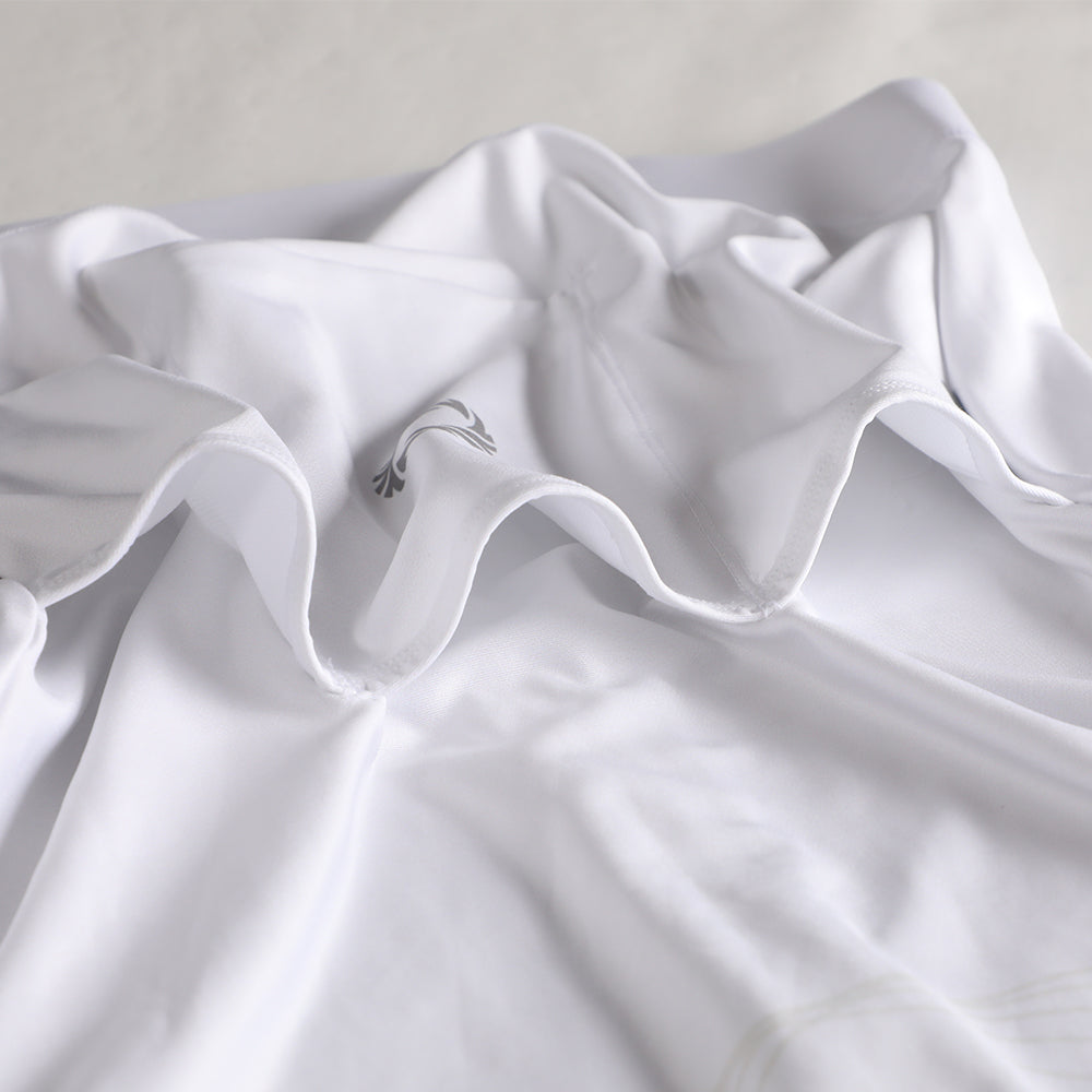 Close-up of white Pinnacle Thermal Jersey, showing subtle Sandline logo and white sheen.
