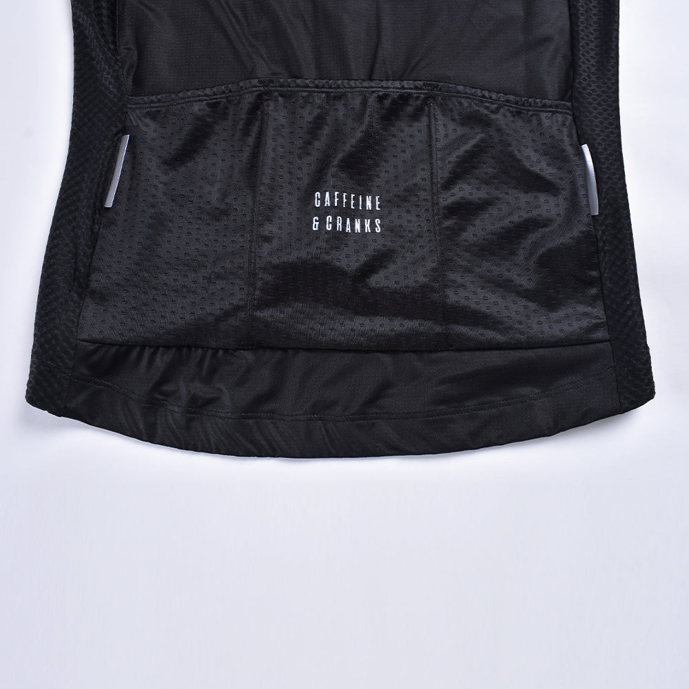 Back view of black C&C Bonk Club cycling jersey with white text, mesh fabric, and silver accents.