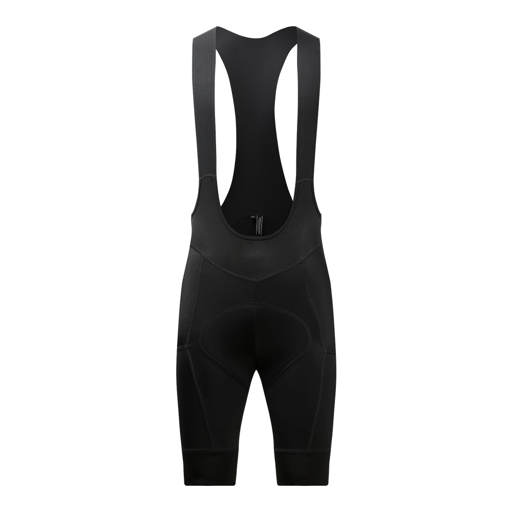 Front view of women's black cargo bib shorts with padded chamois, seamless fit, and breathable fabric.