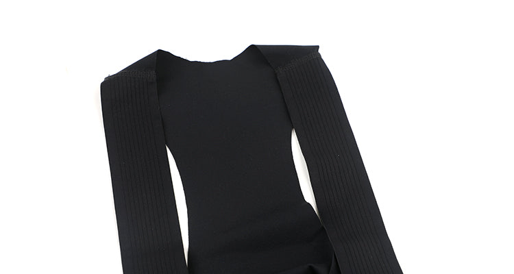 Close-up of black men's cargo bib shorts with ribbed straps.