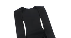 Close-up of black men's cargo bib shorts with ribbed straps.