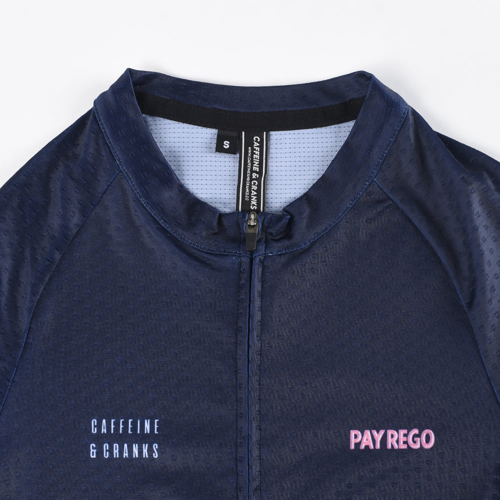 Closeup of womens C&C Pay Rego Jersey in navy blue with "PAY REGO" text.