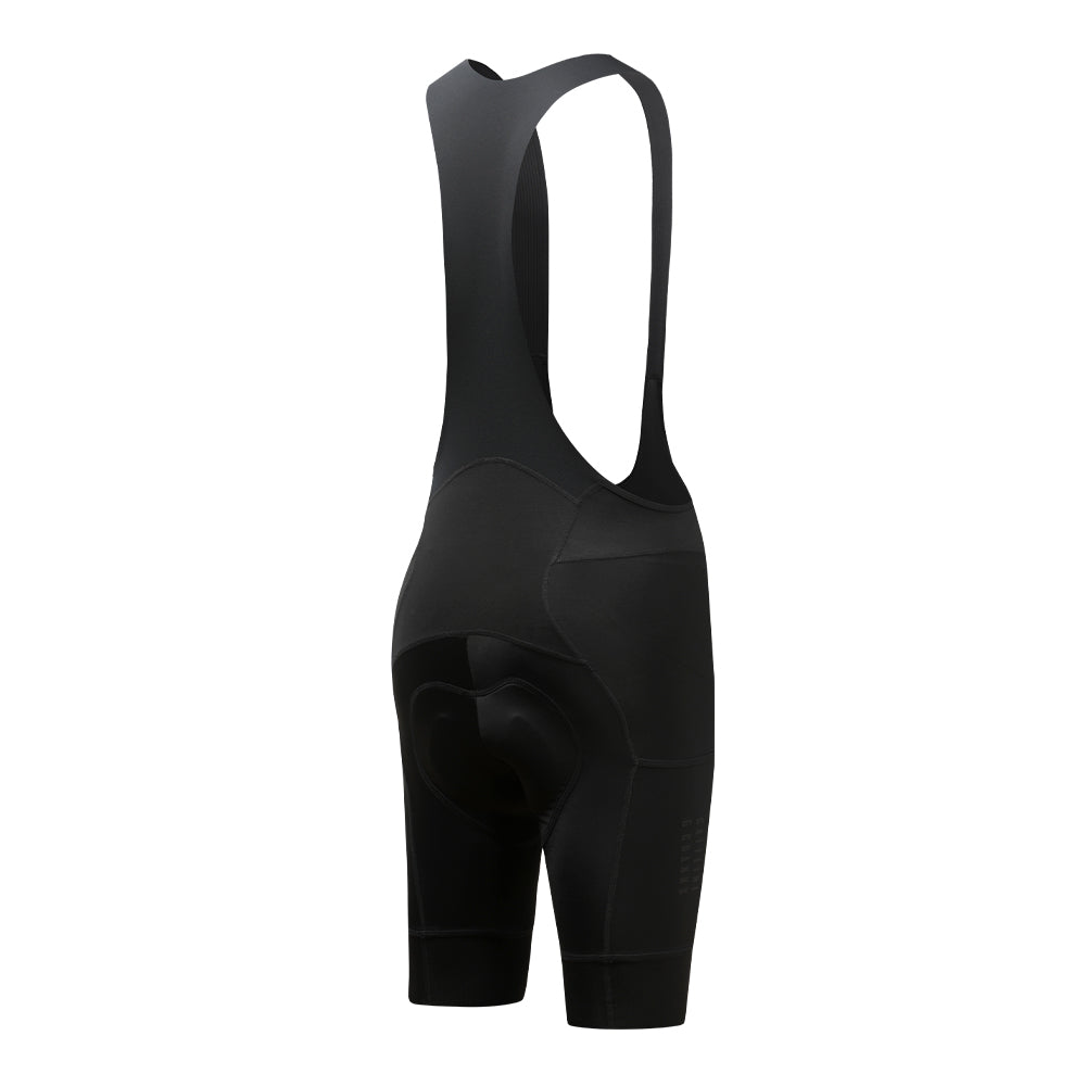 Side view of black men's cargo bib shorts with padded chamois and subtle logo detail.