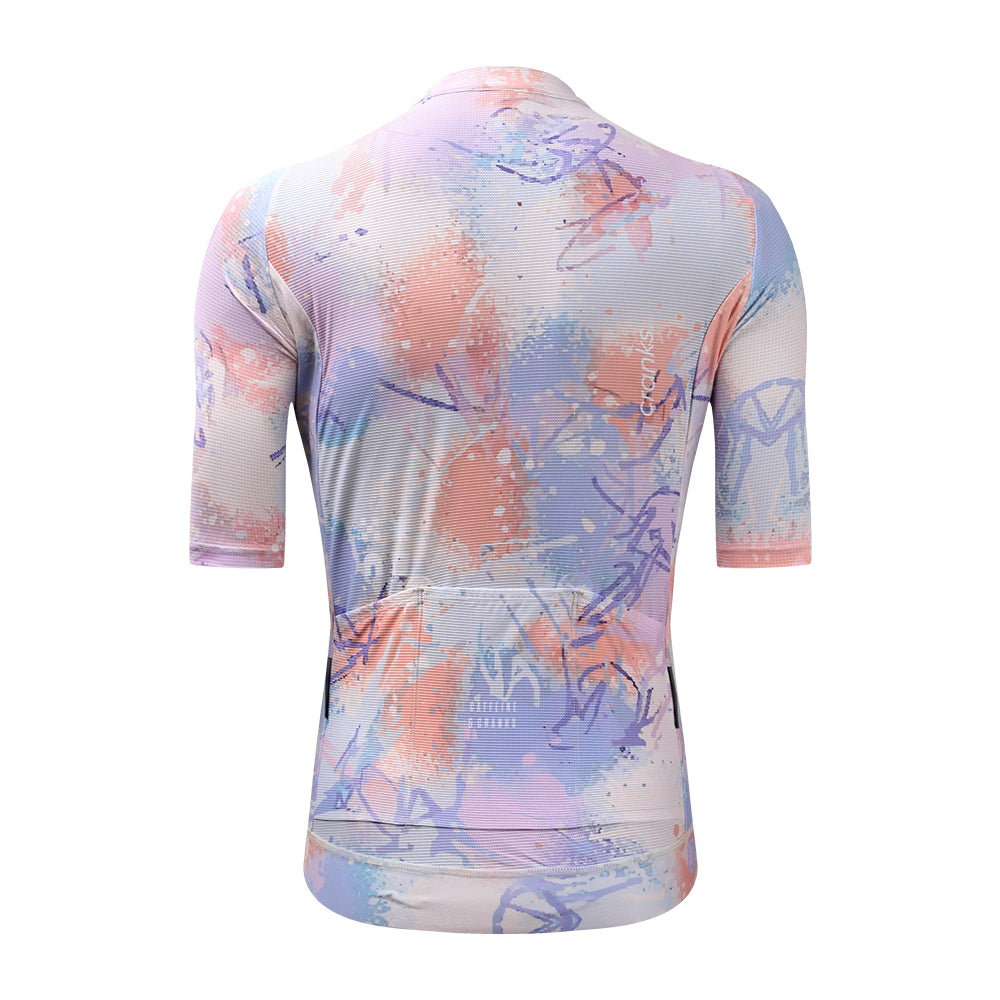 Back view of C&C Vapour Jersey - Womens. Features pastel paint splatter design in pink, purple, and blue.