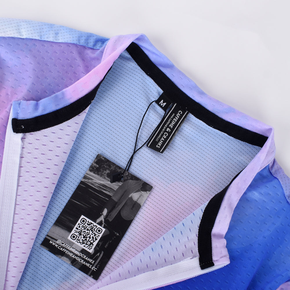 C&C Coral Jersey for men, close up on neck. Features a blue, purple, and pink gradient.