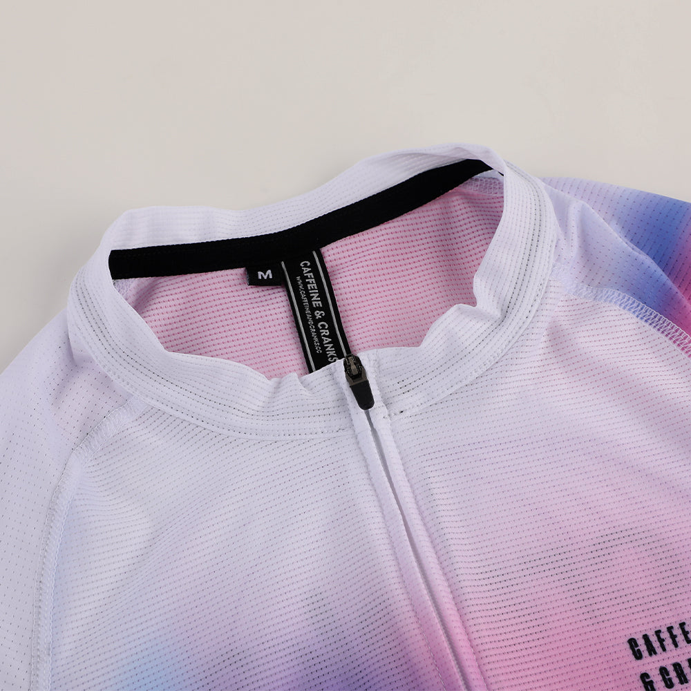 Close-up of C&C Drift Jersey collar & front zip. White with pink/purple color fade.