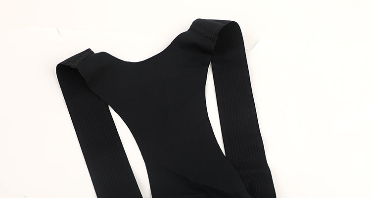 Close-up of black women's cargo bib shorts bib and straps, with ribbed detailing.