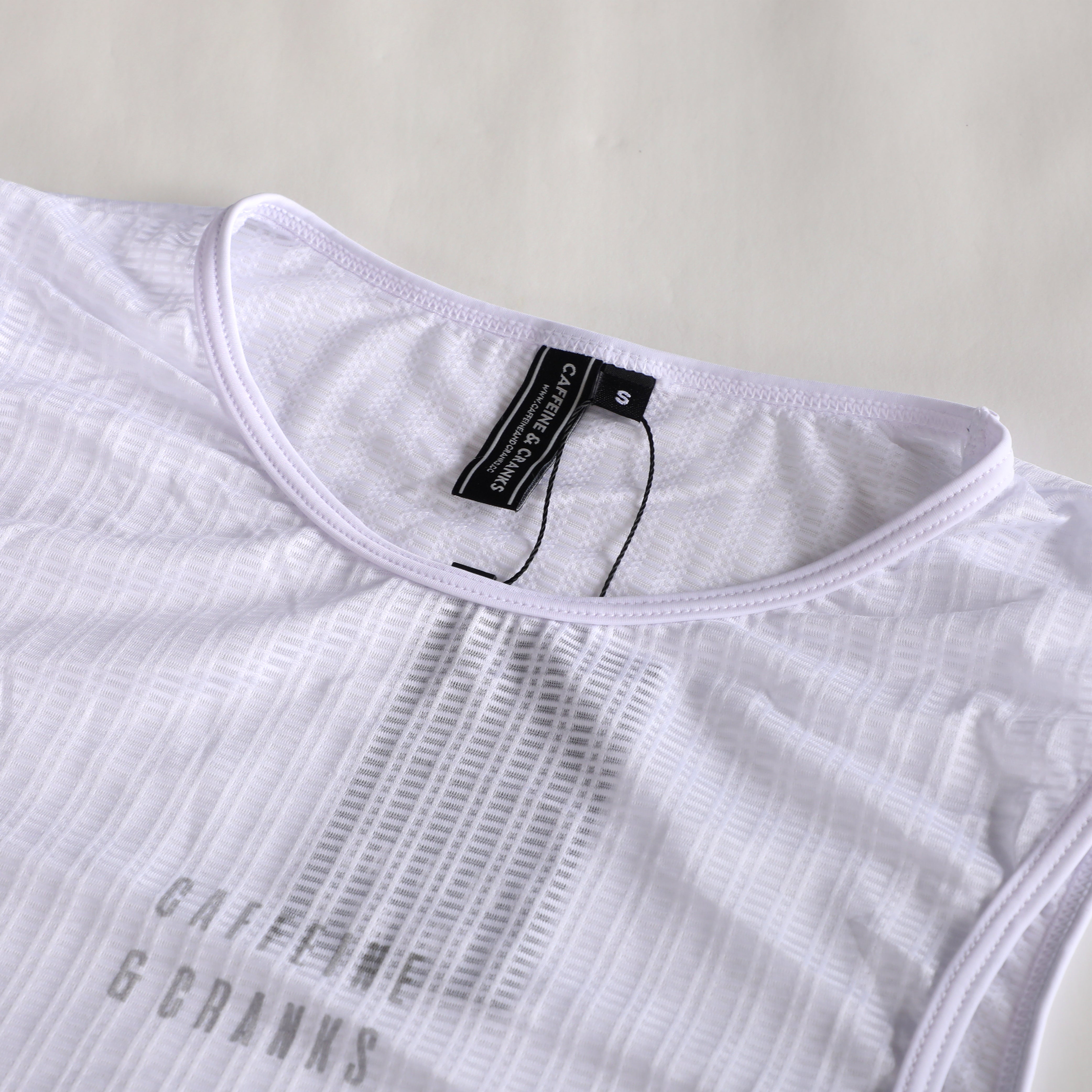 Womens white C&C Core Baselayer with light gray logo detail and crew neck.