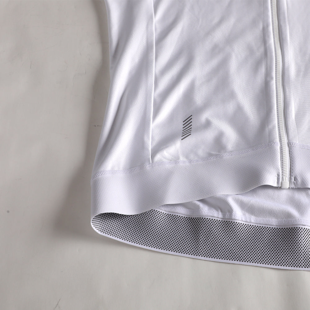 Pinnacle Thermal Jersey - Sandline - Mens. Close-up of zipped white jersey with gray logo detail at hem.