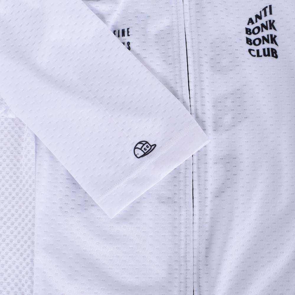 Close-up view of a white C&C Bonk Club jersey with black text and a detailed graphic logo on the sleeve.