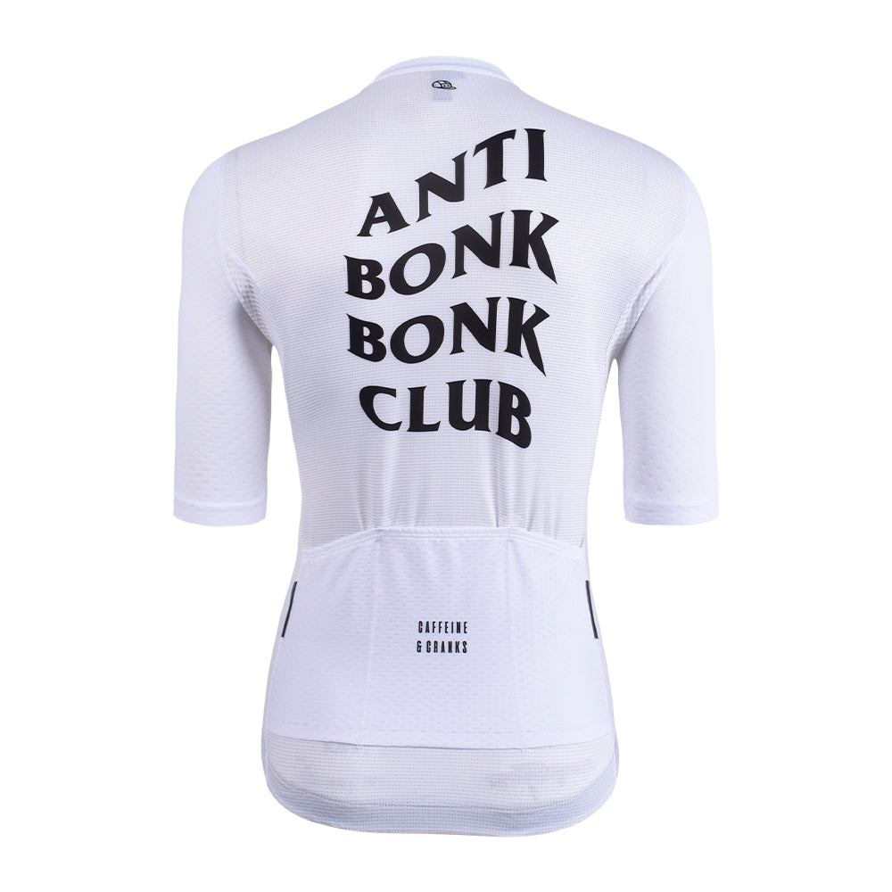 Back view of white C&C Bonk Club cycling jersey for women with black text "ANTI BONK BONK CLUB" and "CAFFEINE & CRANKS".