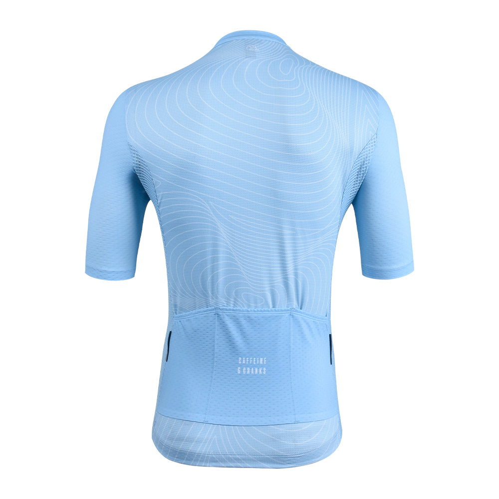 Back view of C&C Cerulean Topo Jersey, light blue with white topographic pattern.