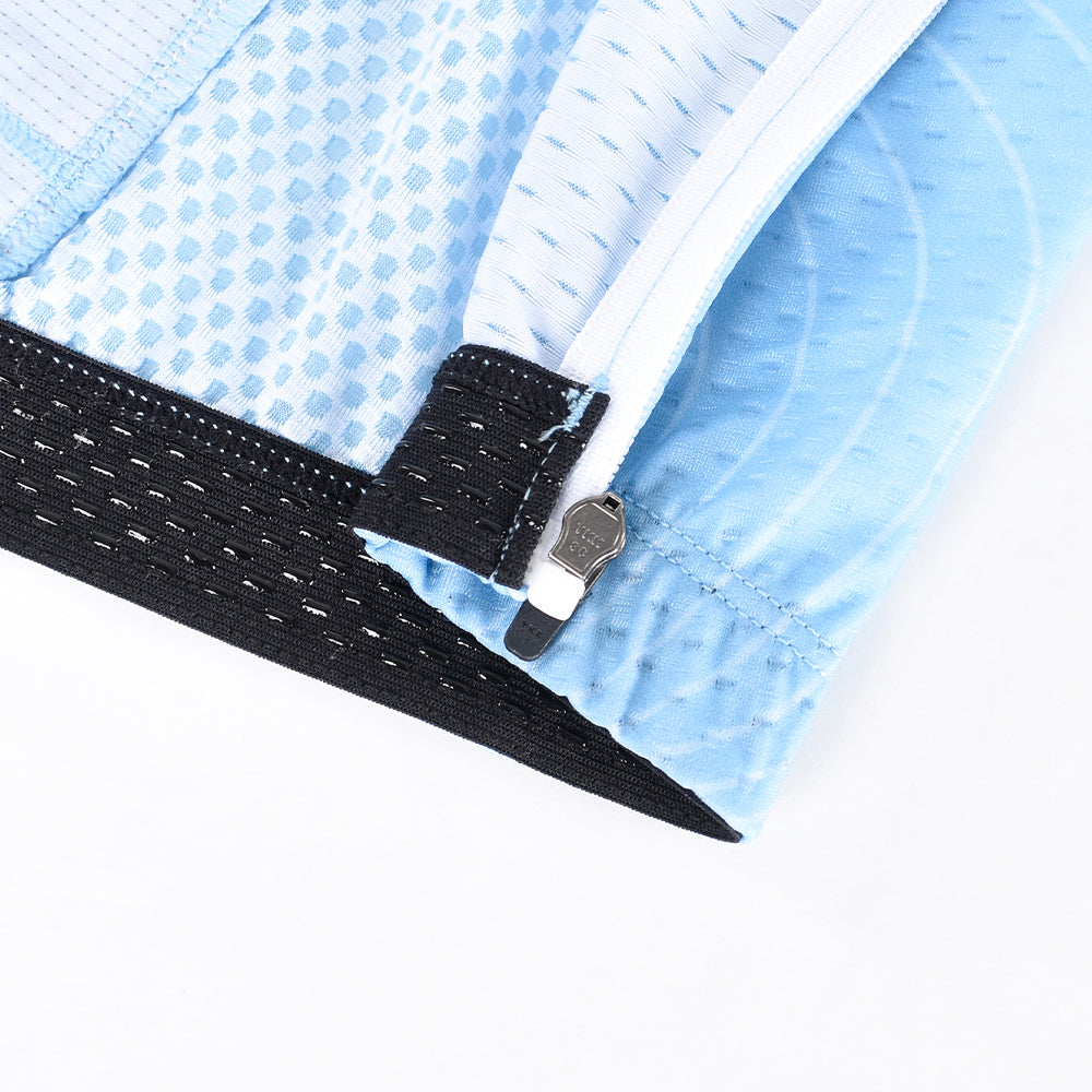 Close up of C&C Cerulean Topo Jersey, showing zipper, black hem and light blue topo pattern.