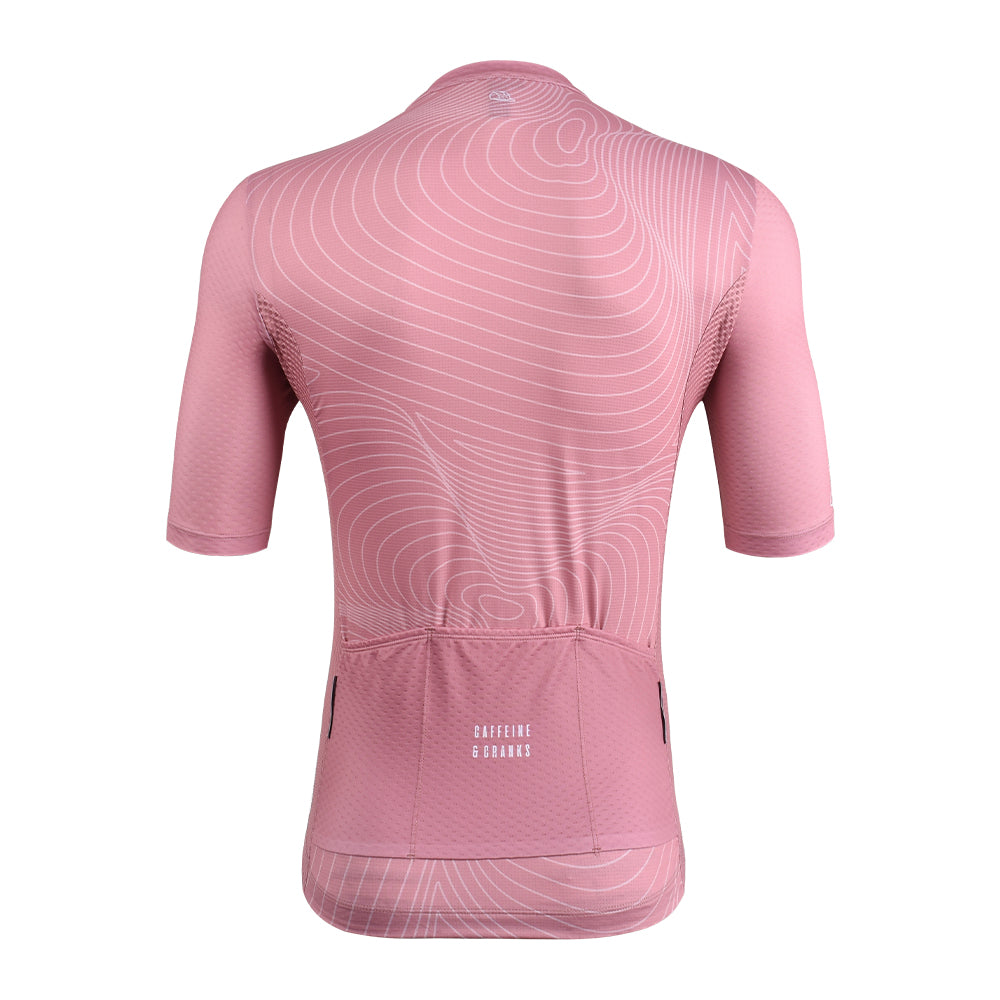 Back view of C&C Garnet Topo Jersey for men, featuring a pink topographic pattern and white "CAFFEINE & CRANKS" logo.