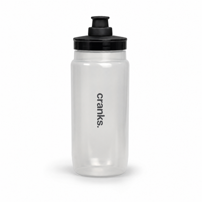 A clear plastic water bottle with a black flip-top lid and the brand name 'cranks.' printed vertically in black on the front, set against a plain white background.